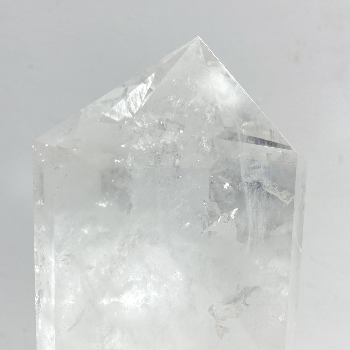 Large Clear Quartz Raw Bottom Point With Stand