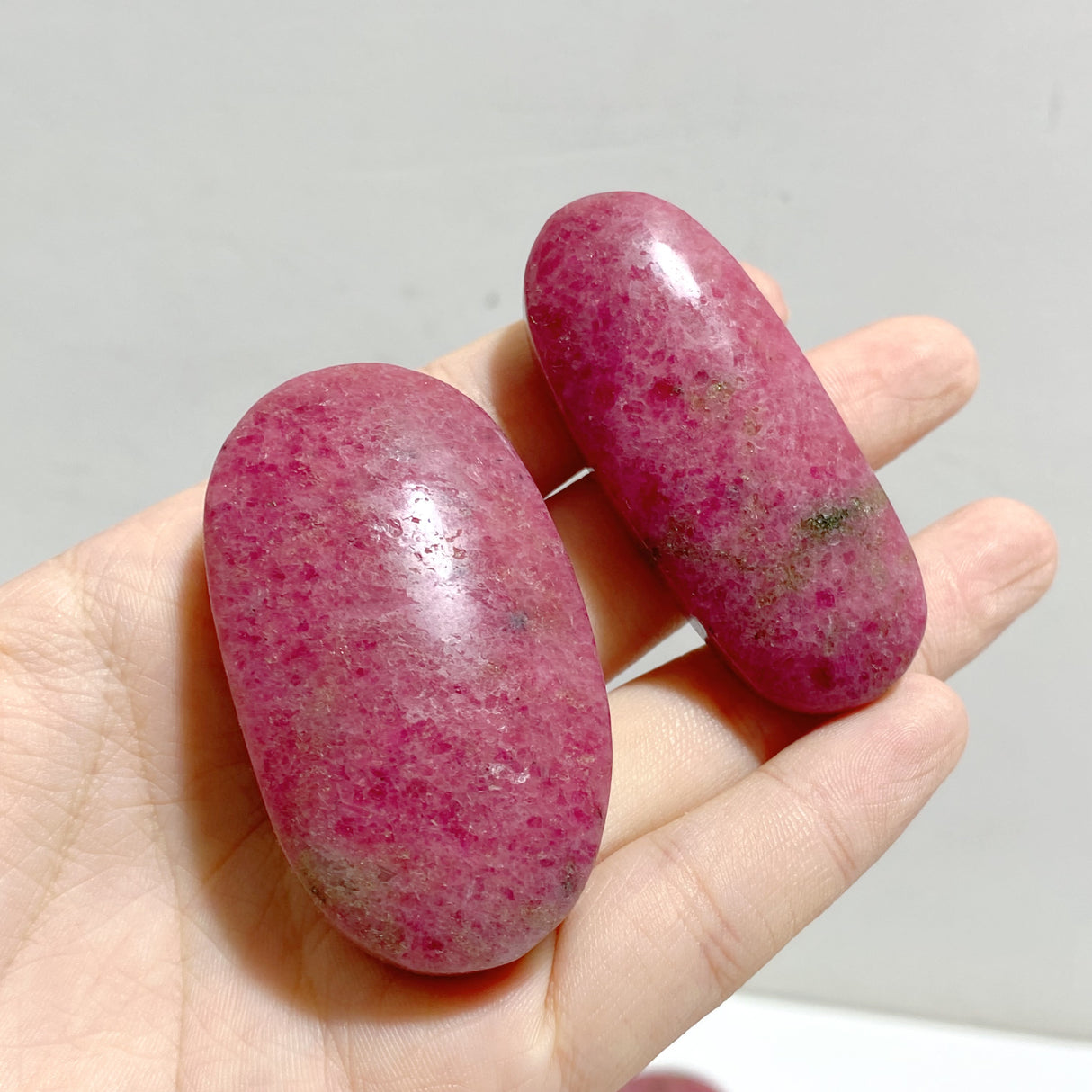 High Quality Rhodonite Palm Stone Wholesale