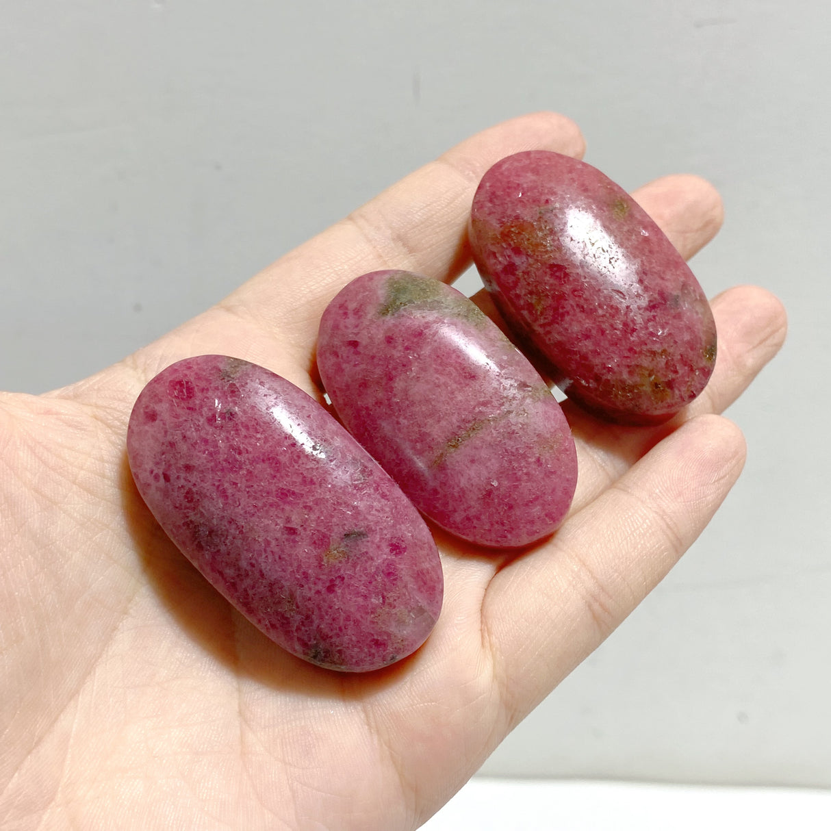 High Quality Rhodonite Palm Stone Wholesale