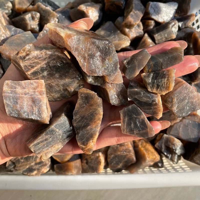 Raw Black Rainbow Sun Stone With Hematite Rough Stone Wholesale - Wholesale Crystals