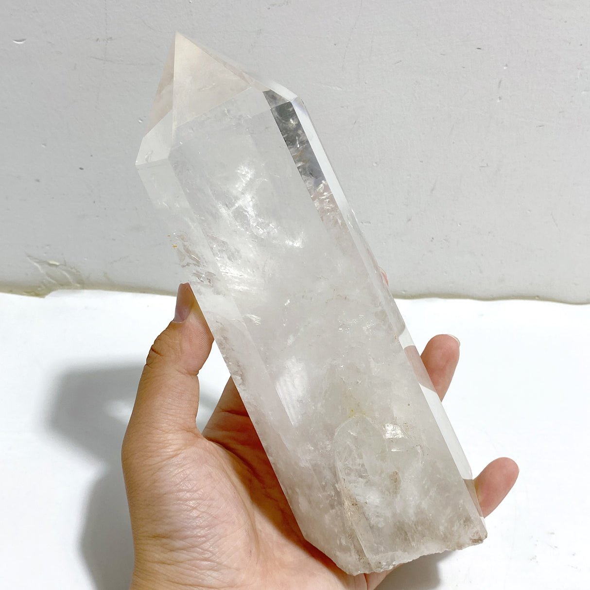 Large Clear Quartz Point Raw Bottom With Stand