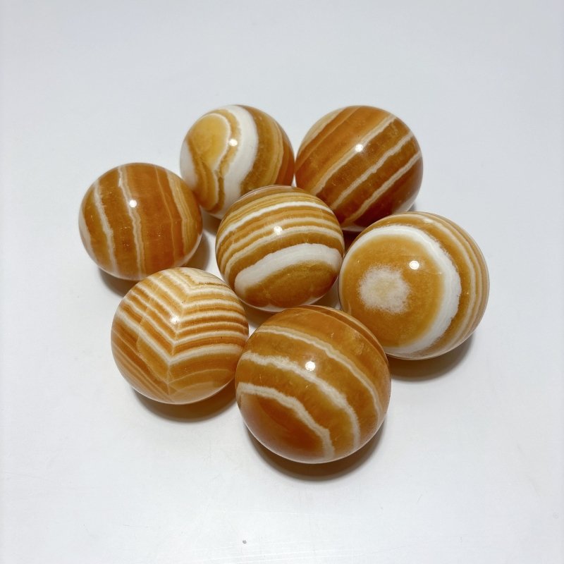 1.9 - 2.5inch Yellow Calcite Stripe Spheres Wholesale - Wholesale Crystals