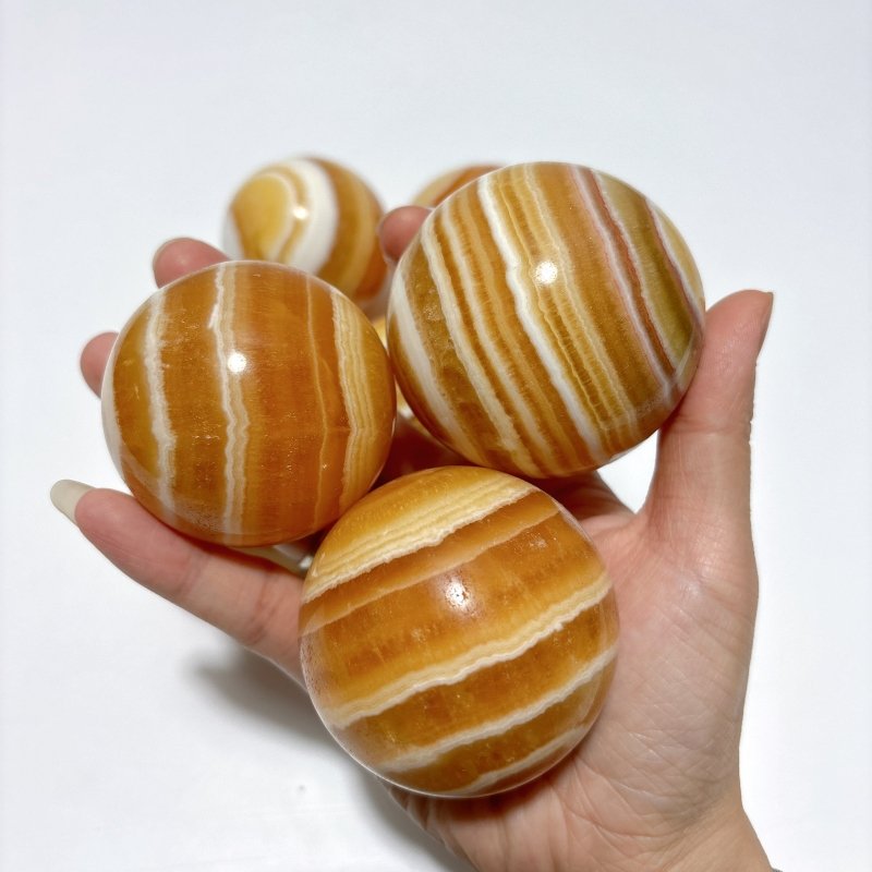 1.9 - 2.5inch Yellow Calcite Stripe Spheres Wholesale - Wholesale Crystals