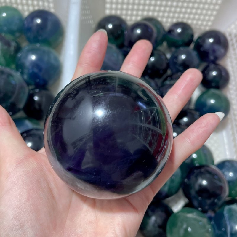 71 Pieces 57.8lbs Deep Green/Purple/Blue Fluorite Spheres - Wholesale Crystals