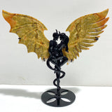 Yellow Ocean Jasper Demon And Angel Wing Carving With Stand