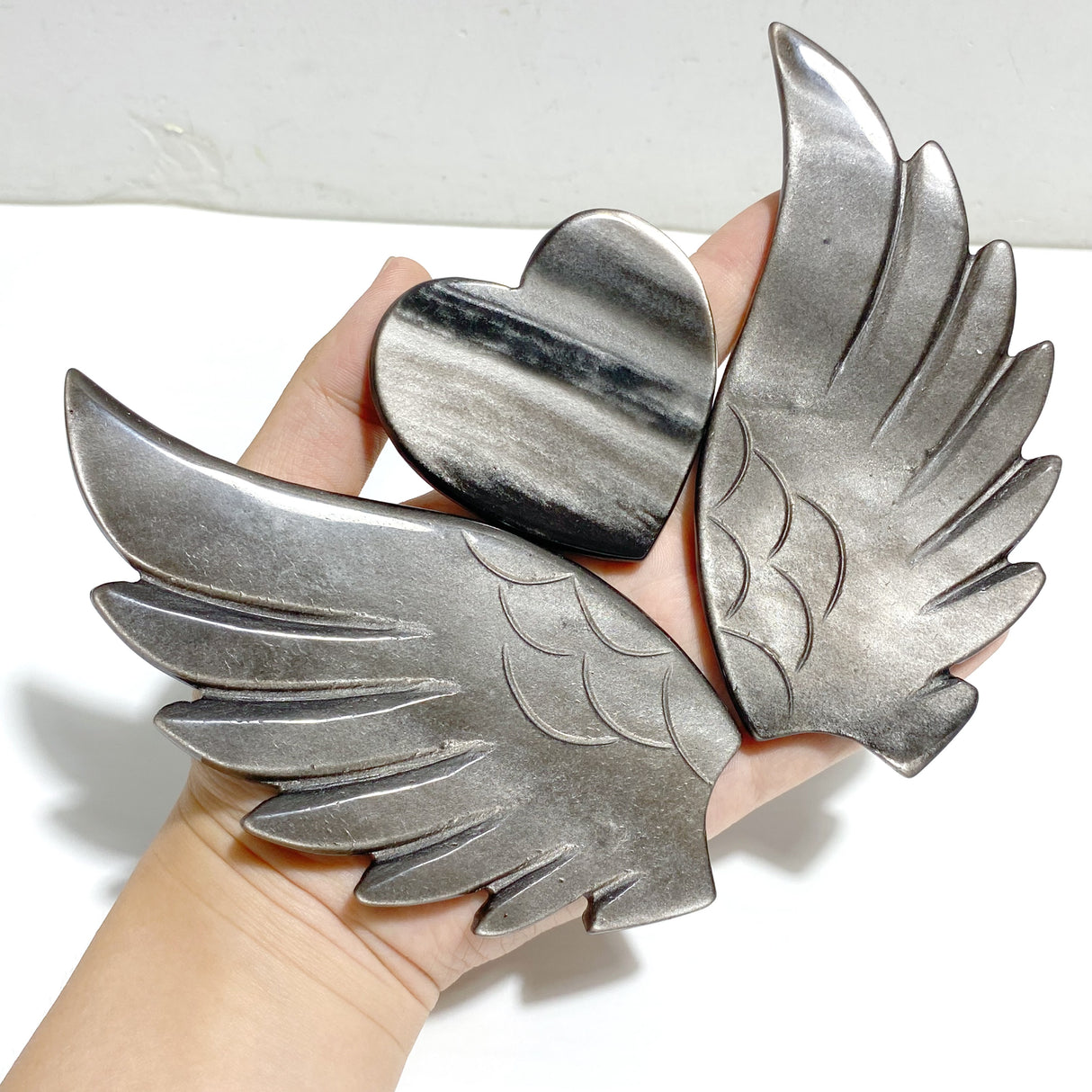 Silver Sheen Obsidian Heart Wing Carving With Stand