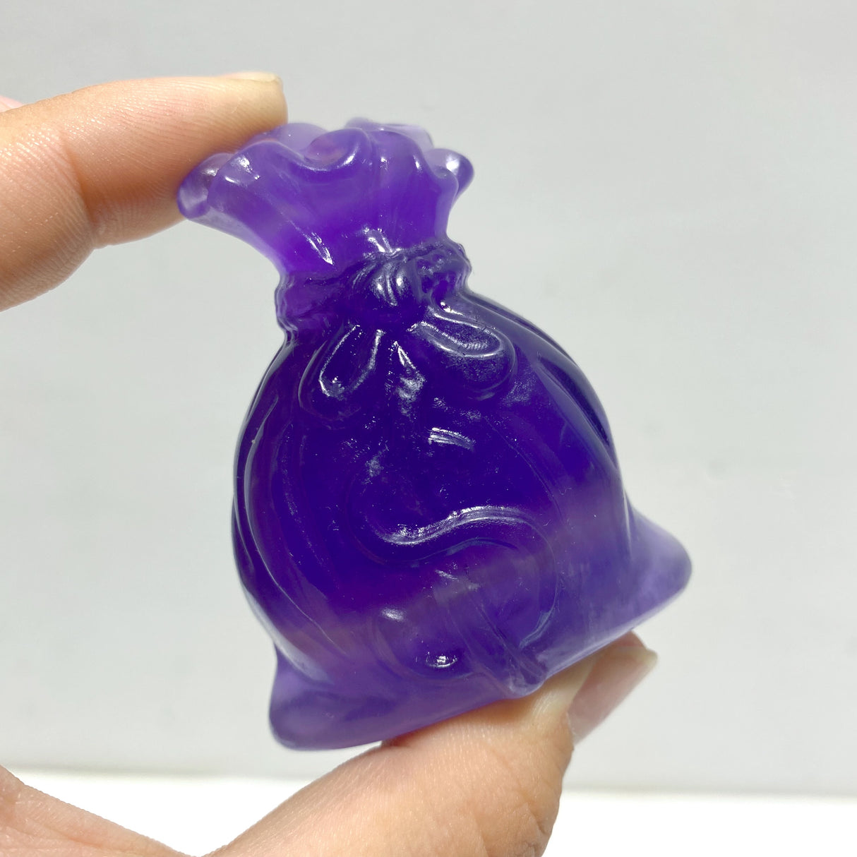 Purple Fluorite Money Bag Carving Wholesale