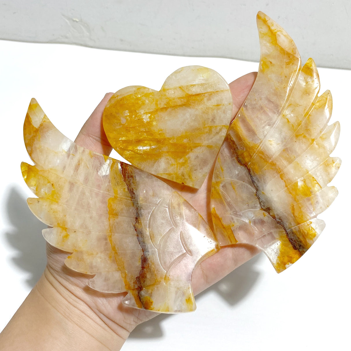 Golden Hematoid Quartz Heart Wing Carving With Stand Fire Quartz