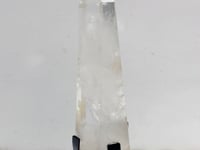 Large Clear Quartz Point Raw Bottom With Stand