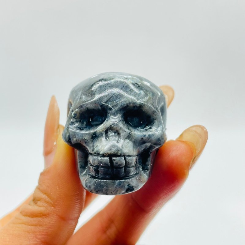 1.7in Skull Carving Wholesale Yooperlite (UV Reactive) Larvikite - Wholesale Crystals